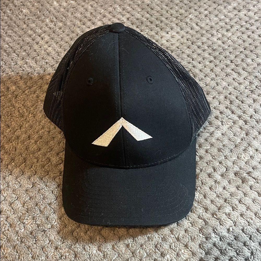 Black Trucker Hat with White upward Logo